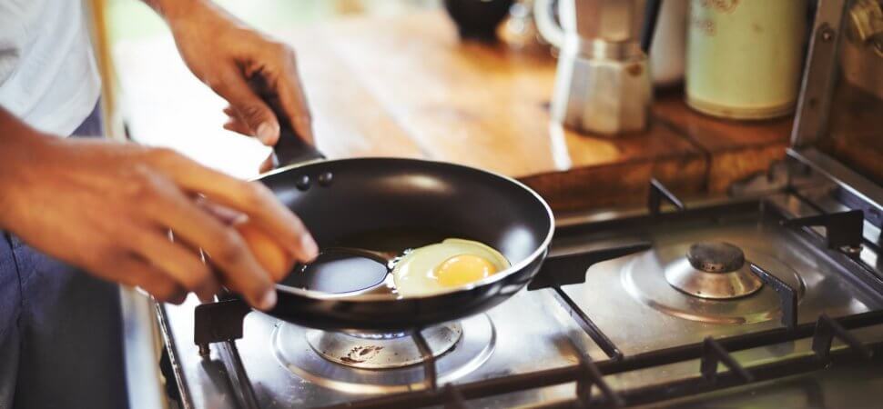 Cracking egg in pan